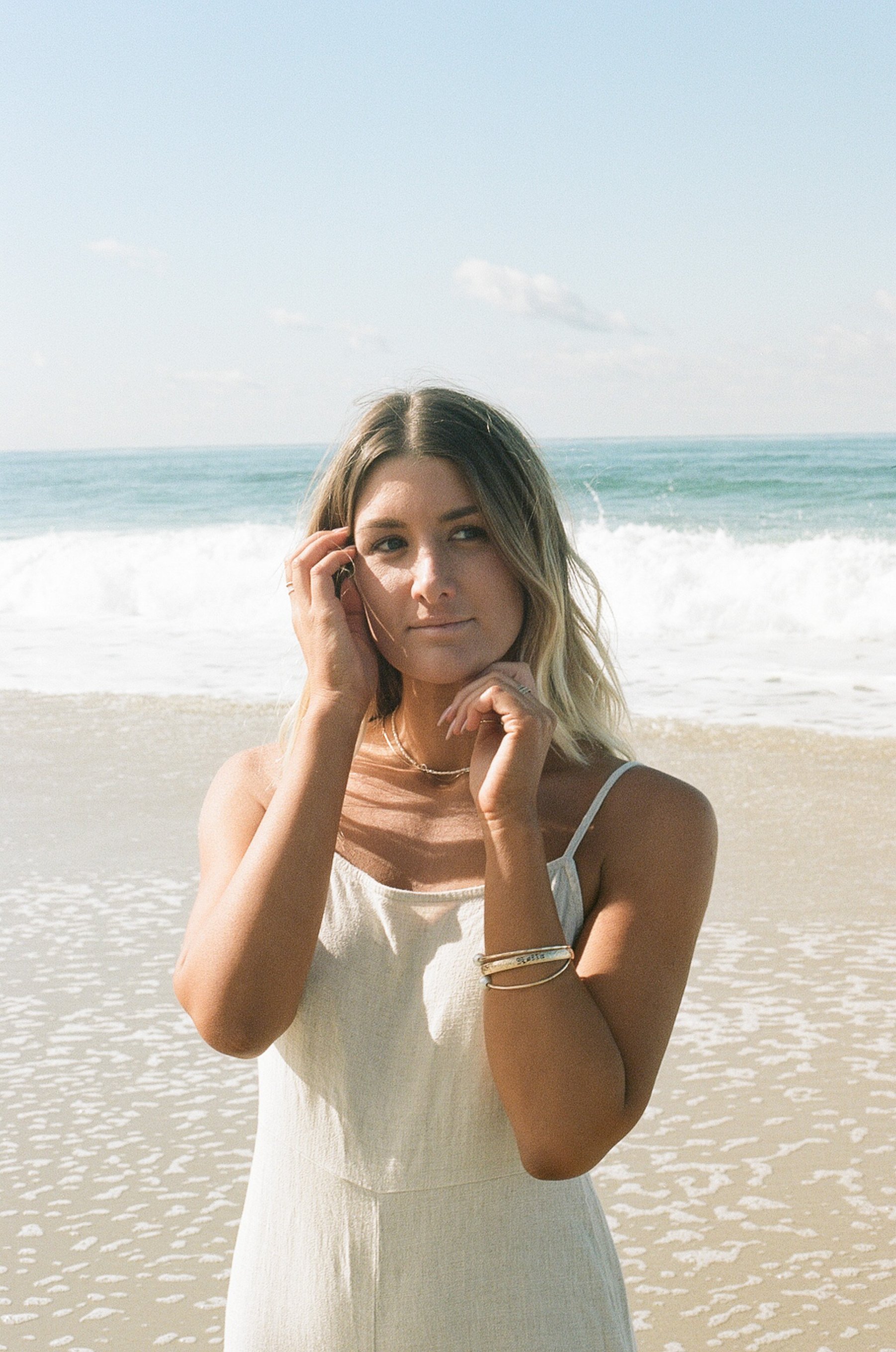 Woman in White Summer Dress at the Beach