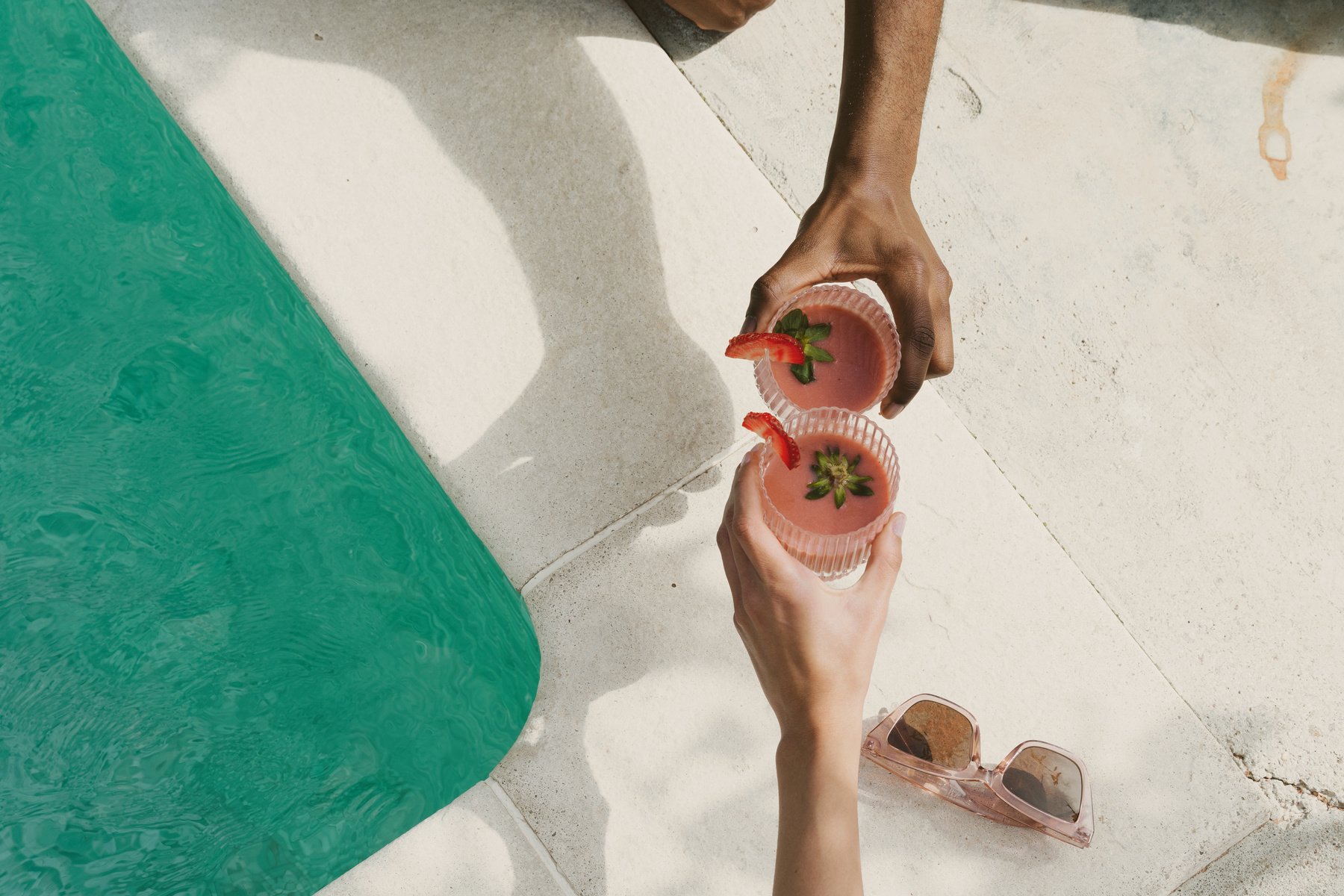 Pool Lifestyle Having Smoothies by a Pool